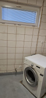  Původní stav koupelny s keramickou dlažbou před obkladem 4